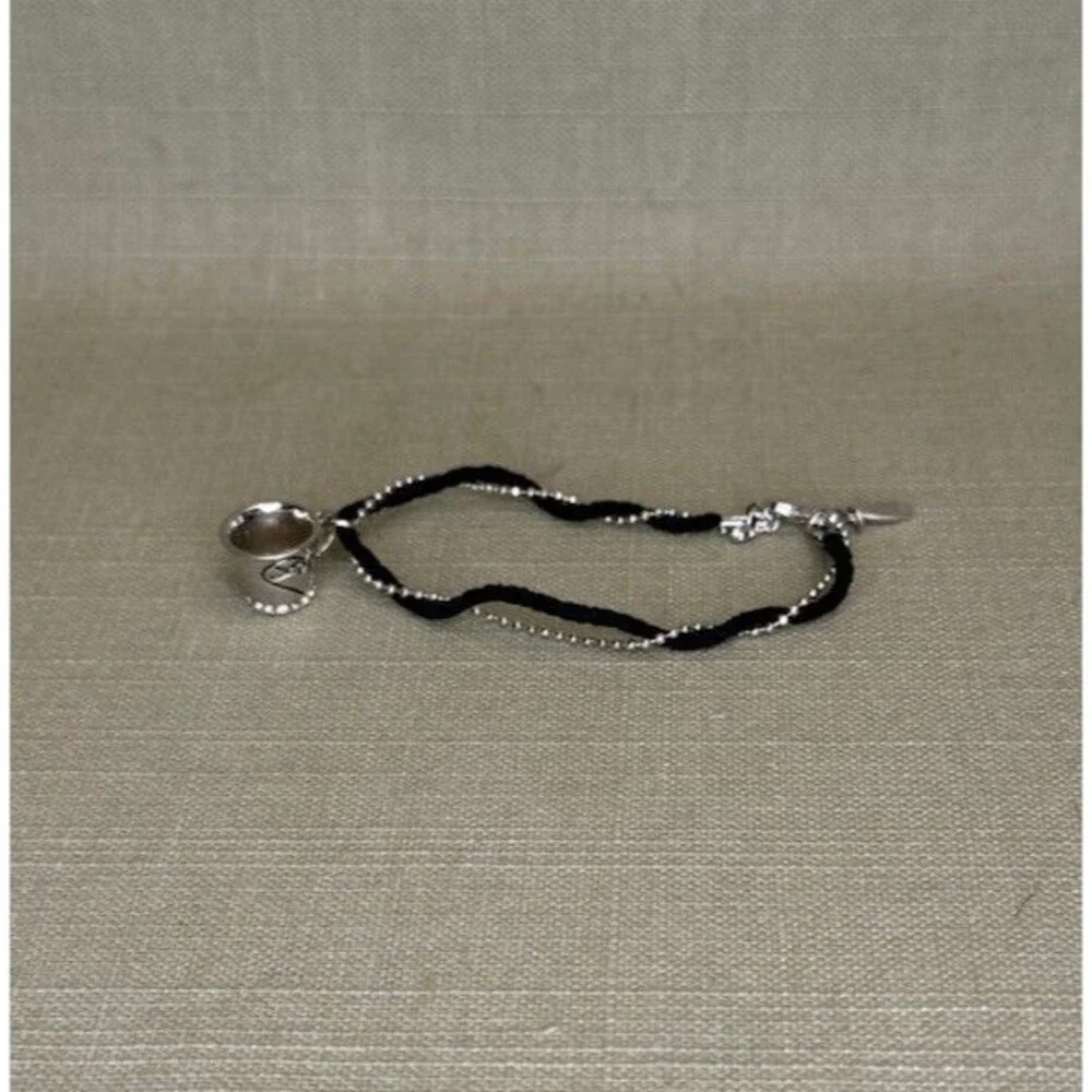 Delicate Silver And Black Cord Bracelet With Toggle Clasp with teacup cup charm